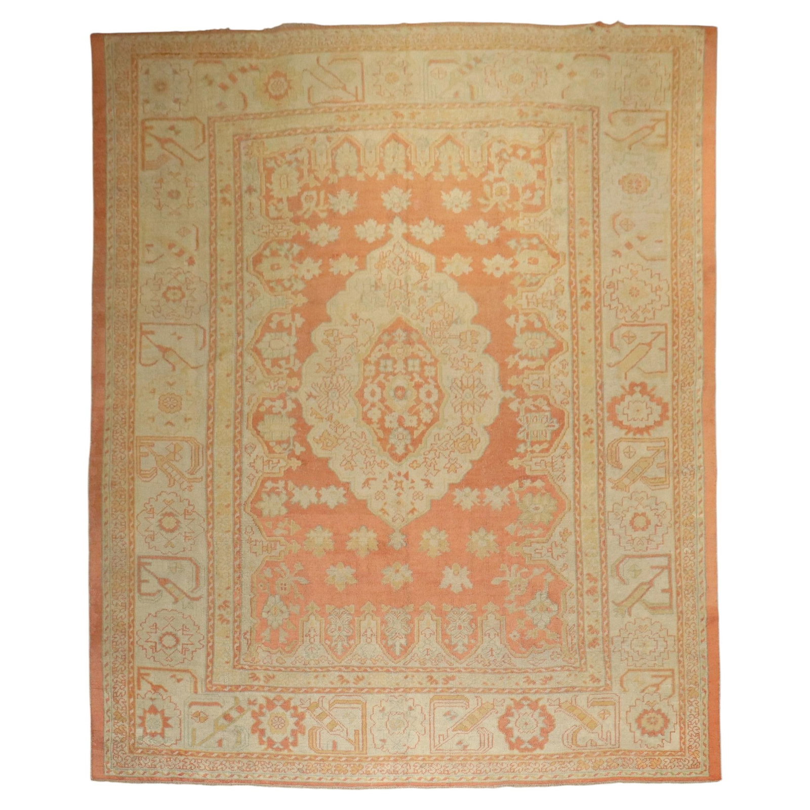 Early 20th Century Turkish Oushak Wool Rug 11' x 14'4": Early 20th Century Turkish Oushak Wool Rug 11' x 14'4" This early 20th-century Turkish Oushak rug features a striking combination of orange and cream tones. Crafted from wool in the Adirondack style, 