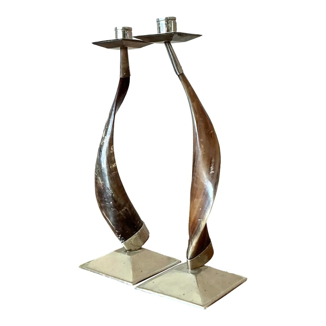 Pair of Twisted Horn and Silver Tone Boho Style Candlesticks: Pair of Twisted Horn and Silver Tone Boho Style Candlesticks This pair of vintage candlesticks features dramatically twisted, polished horn bodies, each showcasing unique natural variations and warm t