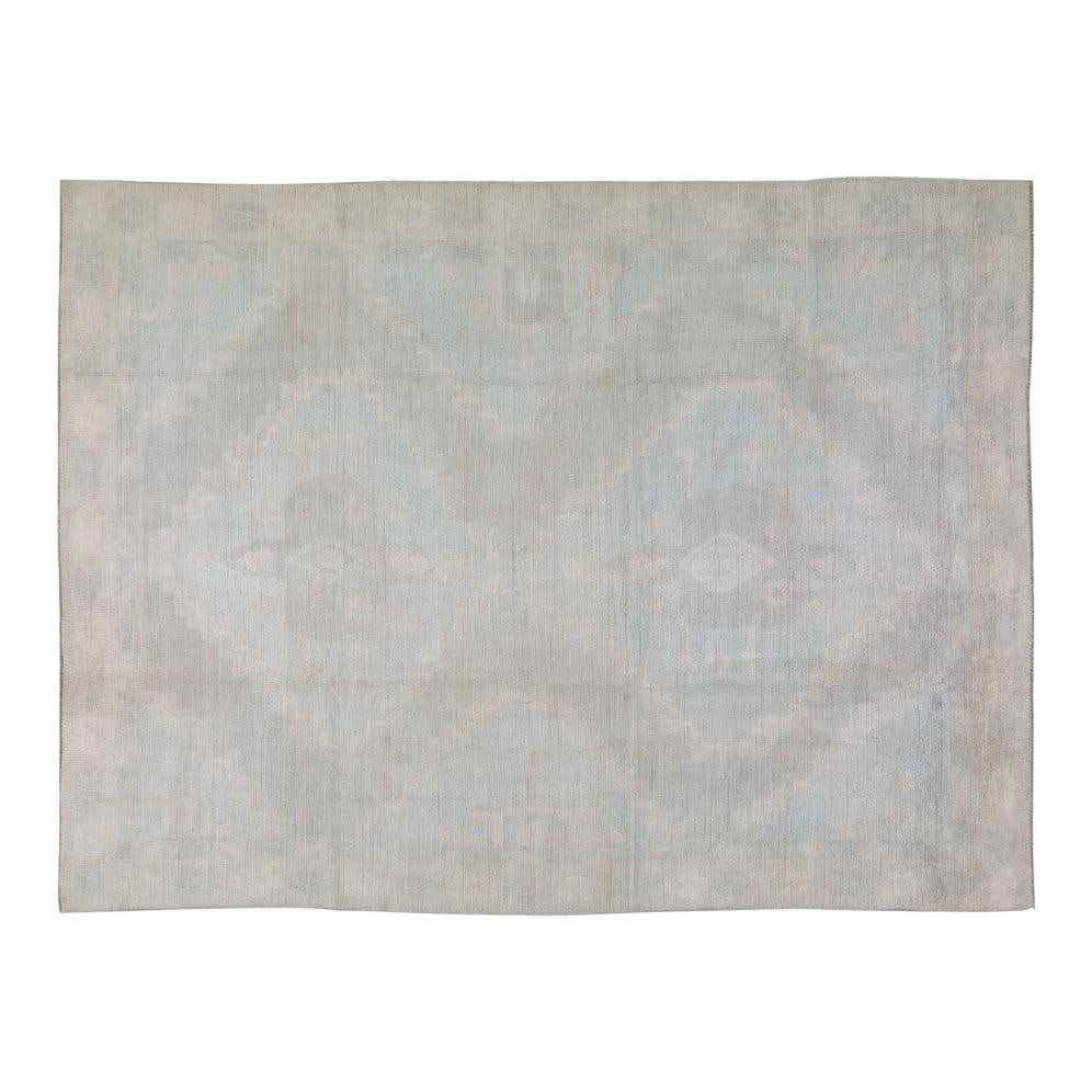 9'2 x 12'1 Wool Area Rug Hand Knotted Oushak Design: 9'2 x 12'1 Wool Area Rug Hand Knotted Oushak Design This Oushak rug is hand-knotted from wool using traditional techniques, blending classic artistry with a modern touch. Its greige color and rich tex