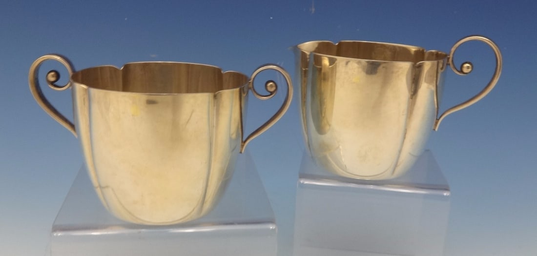 Randahl Sterling Silver Sugar Bowl and Creamer Set 2pc Arts & Crafts: Randahl Sterling Silver Sugar Bowl and Creamer Set 2pc Arts & Crafts This stunning 2-piece set includes a Sterling Silver Sugar Bowl and Creamer, crafted by Randahl between 1900 and 1940. The set feat