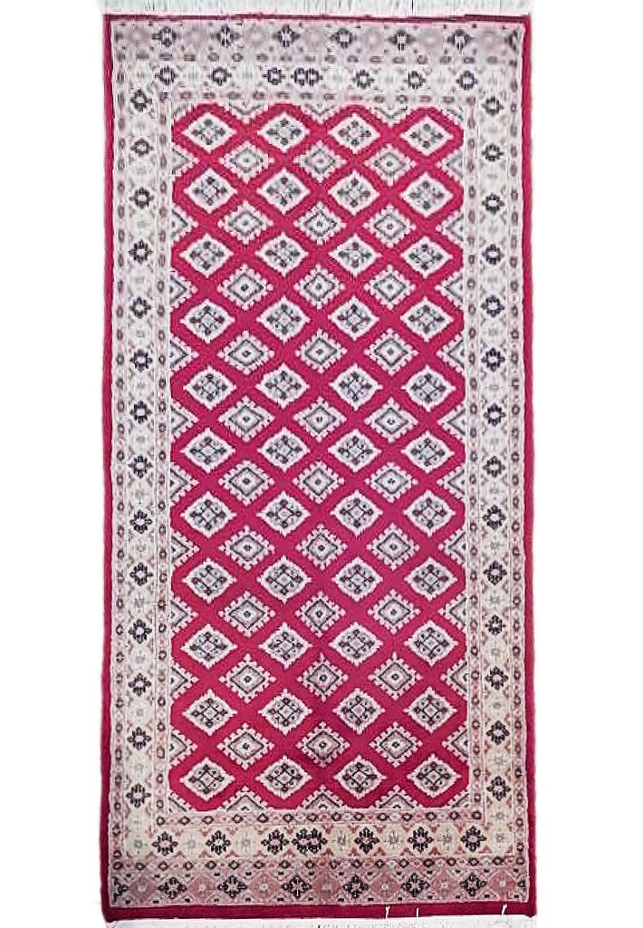 3' x 5.5' Red Jaldar Bokhara Hand-Knotted Area Rug Premium Wool: 3' x 5.5' Red Jaldar Bokhara Hand-Knotted Area Rug Premium Wool Free continental US Shipping Introducing the exquisite 3' x 5' Red Jaldar Bokhara Rug, a timeless masterpiece that effortlessly blends t