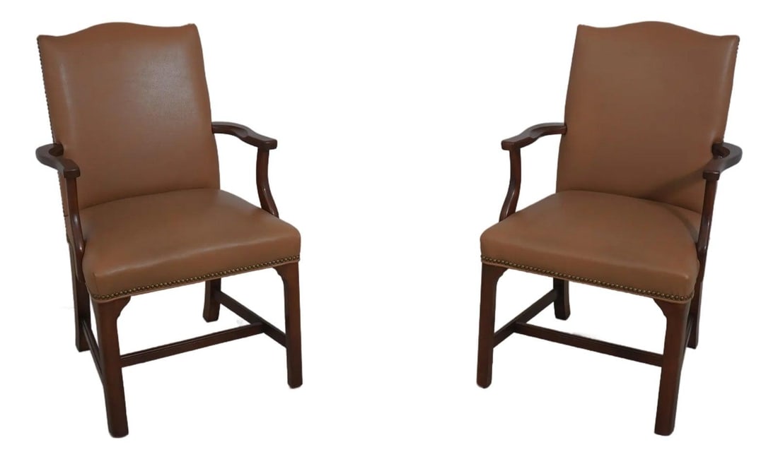Chippendale Style Mahogany Leather Armchairs Pair: Chippendale Style Mahogany Leather Armchairs Pair This elegant pair of Southwood leather and mahogany armchairs features a classic Chippendale style with a high shaped back, showcasing high-quality ma