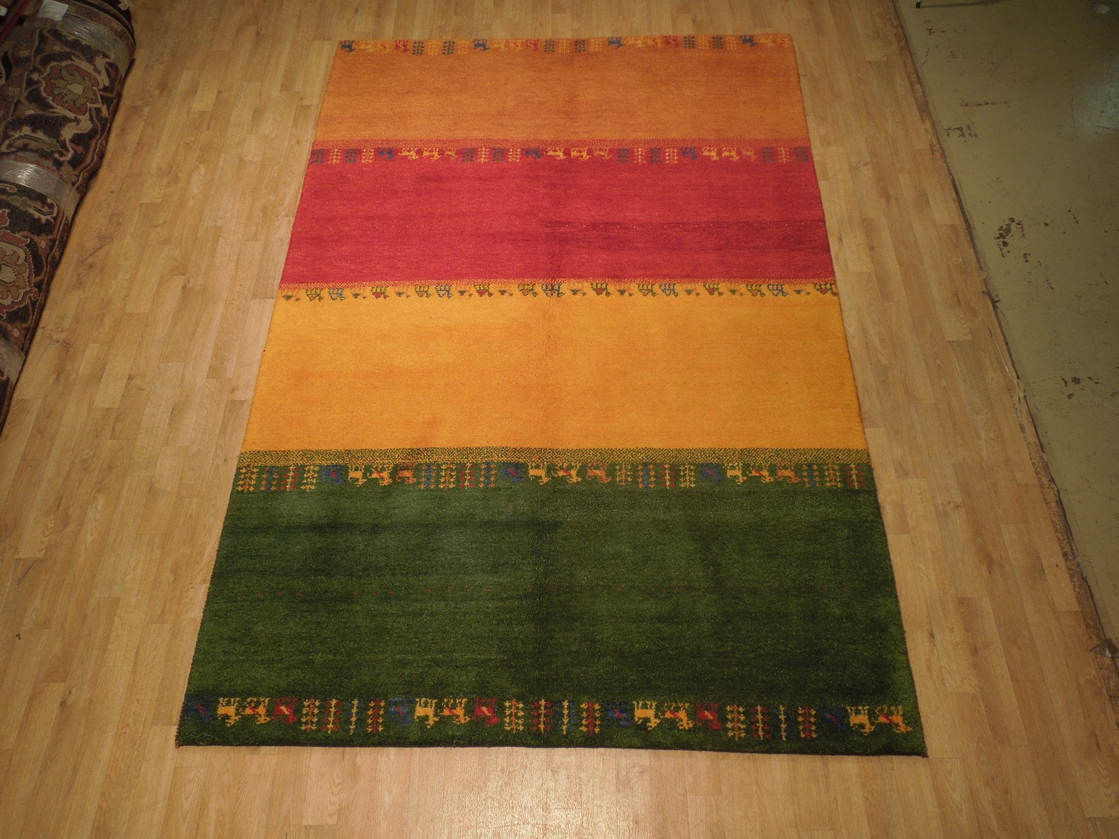 6 x 9 Multi Color Contemporary Gabbeh Rug: 6 x 9 Multi Color Contemporary Gabbeh Rug Free continental US Shipping Enhance your living space with this stunning 6 x 9 Multi Color Contemporary Gabbeh Rug. Crafted with vibrant colors and unique pa