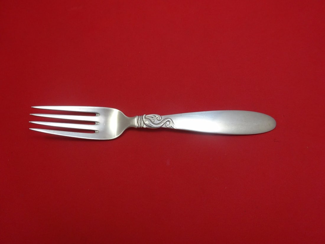 Frigast Dolphin Sterling Silver Dinner Fork 7.5 Inch Heirloom Flatware: Frigast Dolphin Sterling Silver Dinner Fork 7.5 Inch Heirloom Flatware Indulge in the elegance of dining with this Dolphin by Frigast Sterling Silver Dinner Fork, measuring 7 1/2 inches. Crafted from 