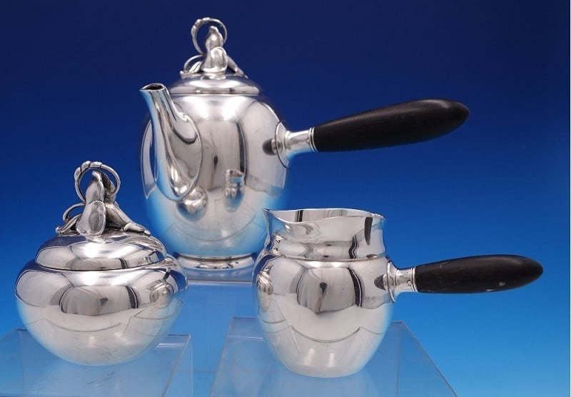 Three-Piece Sterling Silver Coffee Service Hibiscus Pattern by Gorham: Three-Piece Sterling Silver Coffee Service Hibiscus Pattern by Gorham This is a three-piece coffee set from the Hibiscus pattern by Gorham, crafted in sterling silver with Mid-Century Modern styling. 