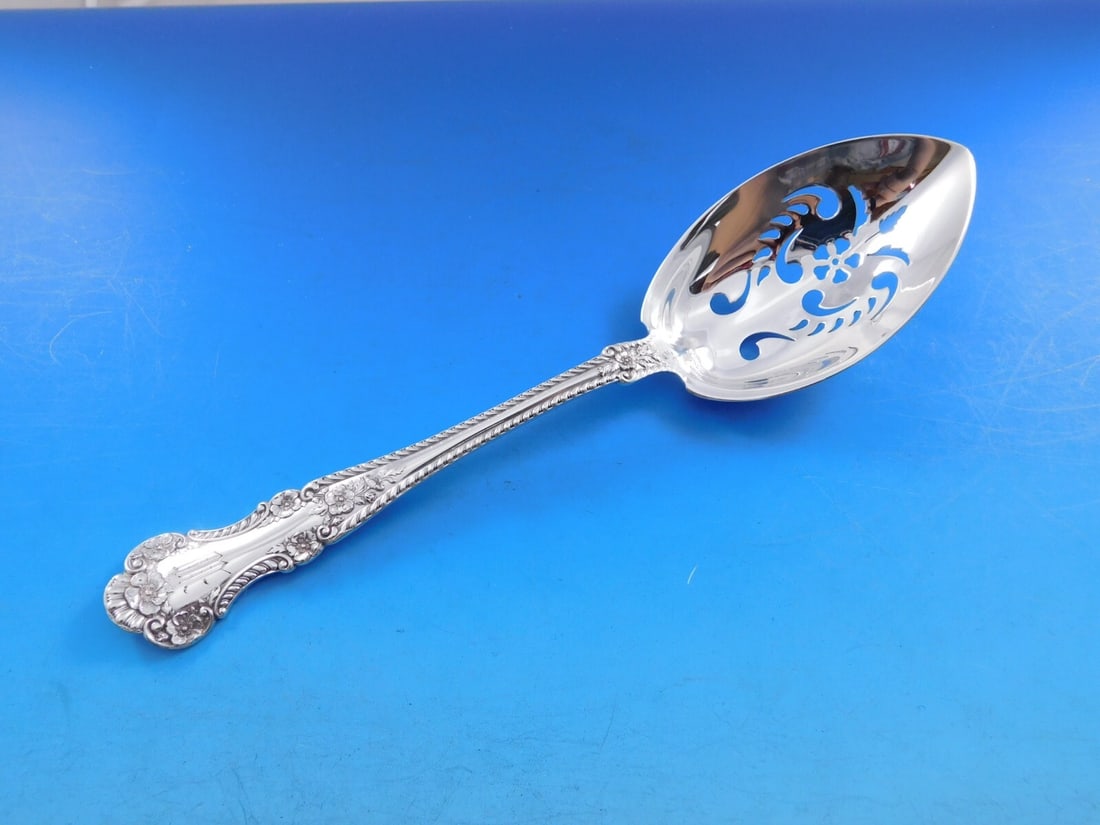 Gorham Cambridge Sterling Silver Ice Spoon 8 3/4 with Pierced Flower Design: Gorham Cambridge Sterling Silver Ice Spoon 8 3/4 with Pierced Flower Design This elegant Cambridge by Gorham ice spoon features a stunning pierced flower design and measures 8 3/4 inches long. Crafted