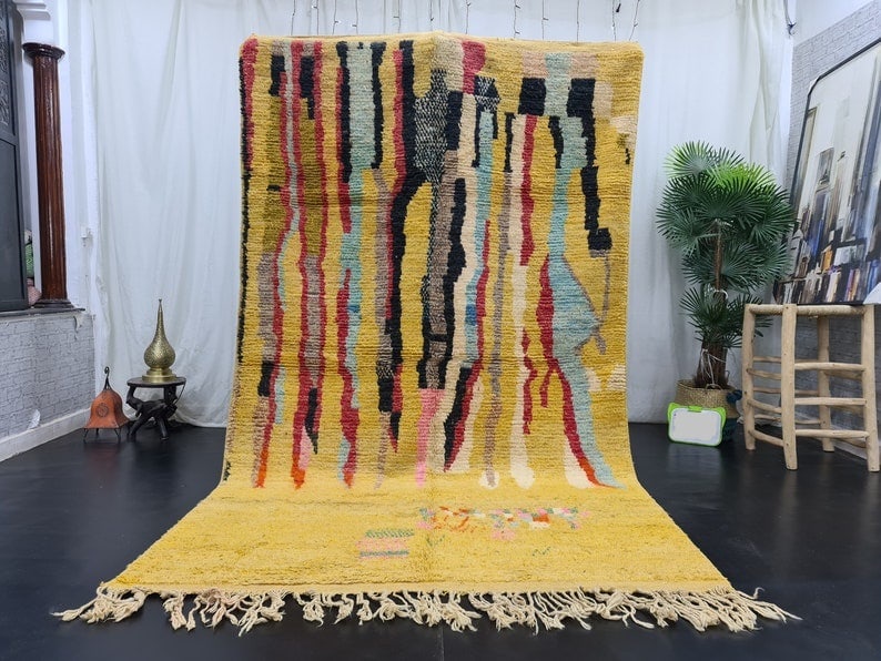 Authentic Handmade Moroccan Berber Wool Rug 8 x 5 Feet: Authentic Handmade Moroccan Berber Wool Rug 8 x 5 Feet Discover the charm of this authentic handmade Moroccan Berber wool rug. Skillfully handwoven in the Middle Atlas Mountains by local Berber women,