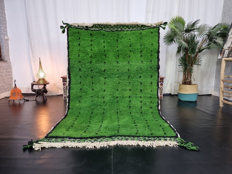 Authentic Green Handmade Moroccan Berber Wool Rug 5 x 6.56 Feet: Authentic Green Handmade Moroccan Berber Wool Rug 5 x 6.56 Feet Enhance your space with this authentic green Handmade Moroccan Berber Wool Rug, featuring a striking black assorted pattern. Handwoven i