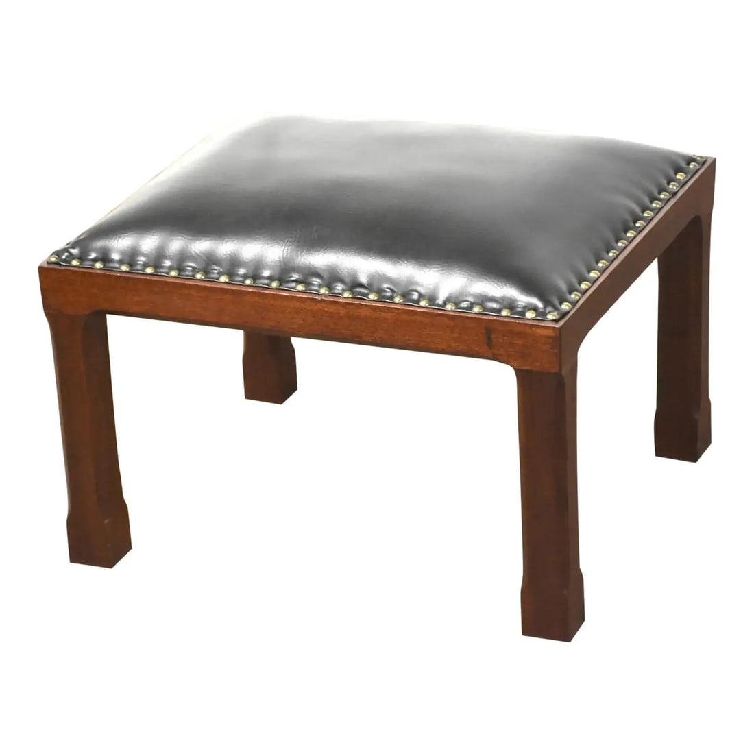 1960s Mahogany Ottoman with Black Vinyl Upholstery: 1960s Mahogany Ottoman with Black Vinyl Upholstery This stylish 1960s ottoman features a solid mahogany frame complemented by a sleek black vinyl upholstery. Its versatile design makes it an excellent