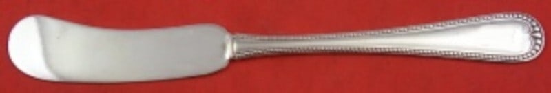 Gorham Newcastle Sterling Silver Butter Spreader 6 1/8 Inch Knife: Gorham Newcastle Sterling Silver Butter Spreader 6 1/8 Inch Knife This exquisite butter spreader features the elegant Newcastle pattern by Gorham, crafted from high-quality sterling silver. With a fla