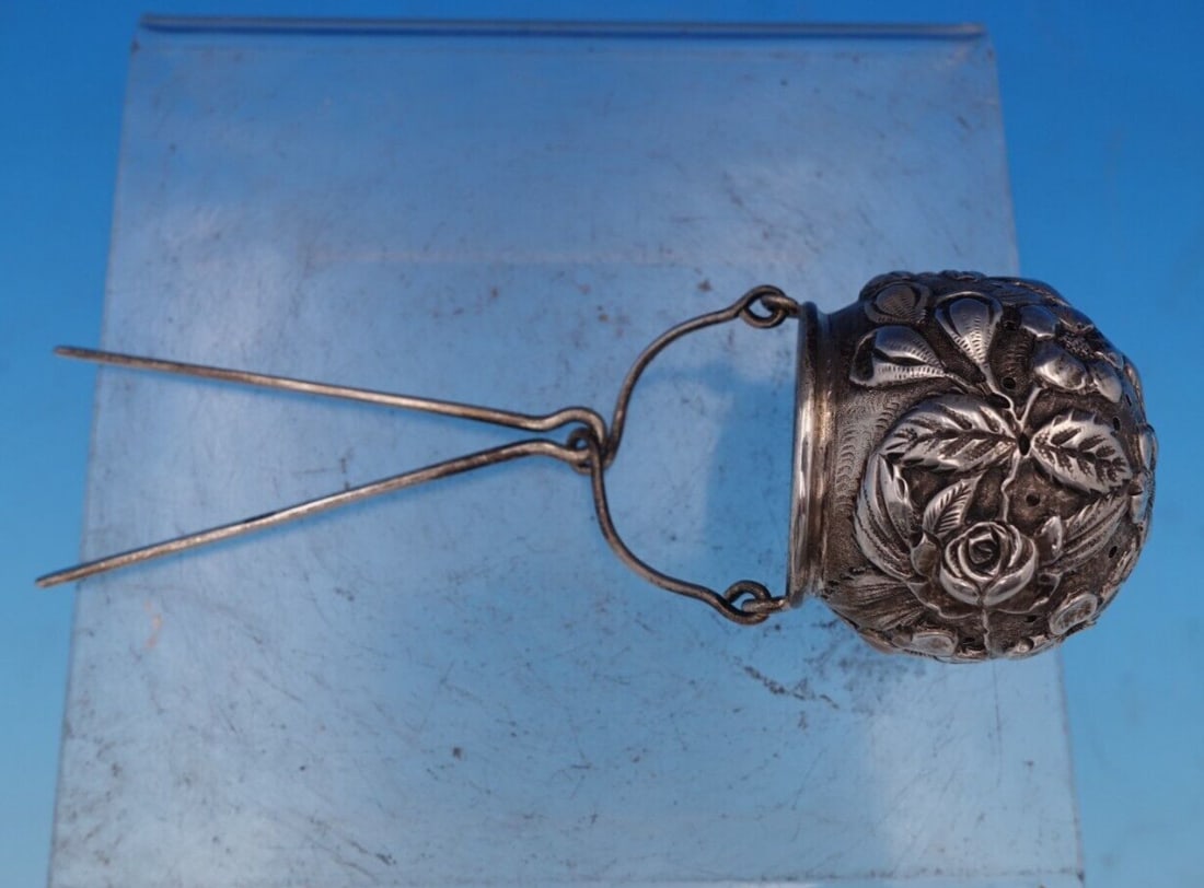 Kirk Repousse Sterling Silver French Style Tea Strainer 6.5 x 2: Kirk Repousse Sterling Silver French Style Tea Strainer 6.5 x 2 Discover the exquisite craftsmanship of the Repousse by Kirk Sterling Silver Tea Strainer, a beautiful example of French style design. M