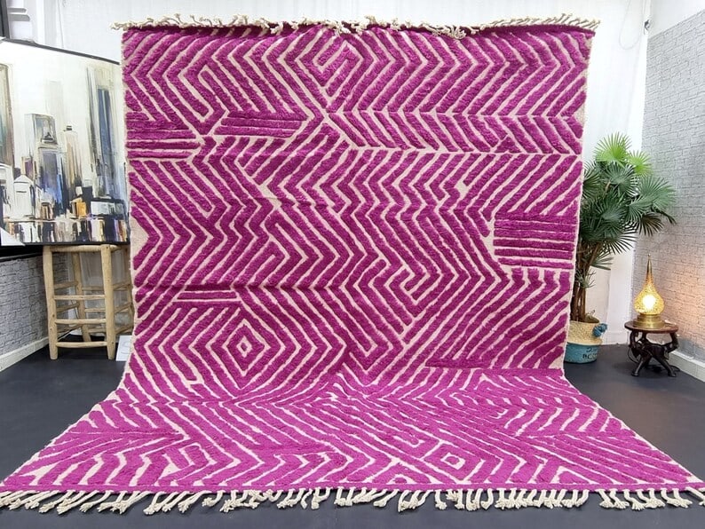 Authentic Pink Engraved Rug 100% Wool Handwoven in Morocco 10 x 6.56 Feet: Authentic Pink Engraved Rug 100% Wool Handwoven in Morocco 10 x 6.56 Feet Discover the beauty of this Elegant Pink Engraved Rug, handwoven in the Atlas Mountains by skilled local Berber women weavers.