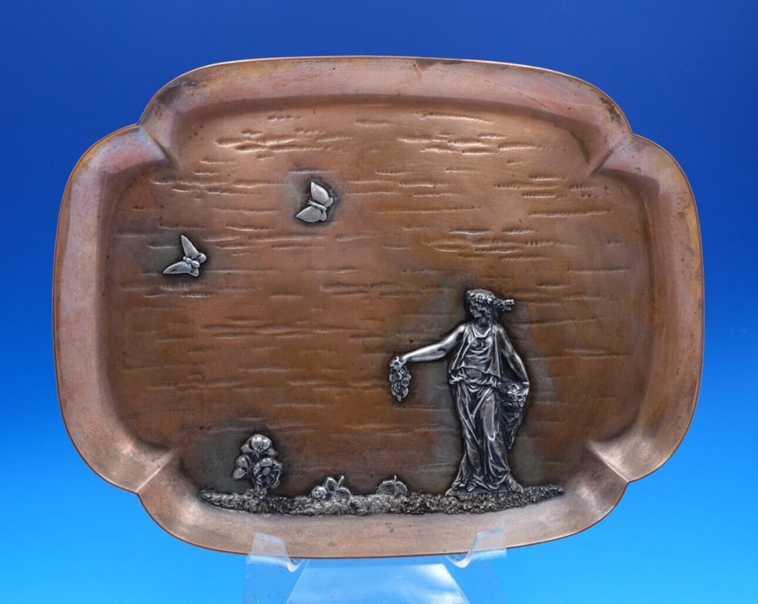 Gorham Applied Metals Copper Tray with Silver Woman and Butterflies: Gorham Applied Metals Copper Tray with Silver Woman and Butterflies This exquisite tray from Gorham's Applied Metals collection features a captivating design showcasing a silver woman adorned with a b