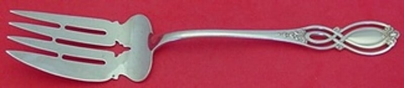 Alvin Chippendale Old Sterling Silver Cold Meat Fork 8 5/8 inches: Alvin Chippendale Old Sterling Silver Cold Meat Fork 8 5/8 inches This exquisite Chippendale Old cold meat fork by Alvin is a classic addition to any dining collection. Crafted from sterling silver, t