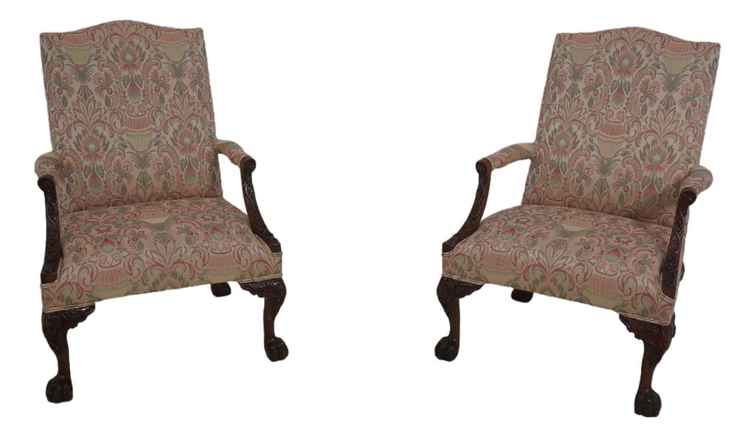 Set of Two Upholstered Chippendale Style Armchairs with Carved Paw Feet: Set of Two Upholstered Chippendale Style Armchairs with Carved Paw Feet This pair of Chippendale style armchairs features ornate carved frames and distinctive paw feet. Professionally reupholstered, t