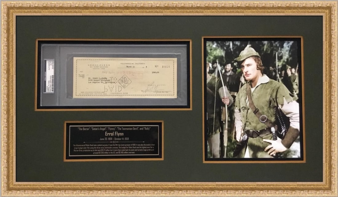 Framed Errol Flynn signed bank check with Robin Hood image PSA DNA: Framed Errol Flynn signed bank check with Robin Hood image PSA DNA This framed display features an original 3" x 8" bank check signed by Errol Flynn, encapsulated and authenticated by PSA/DNA in a tam