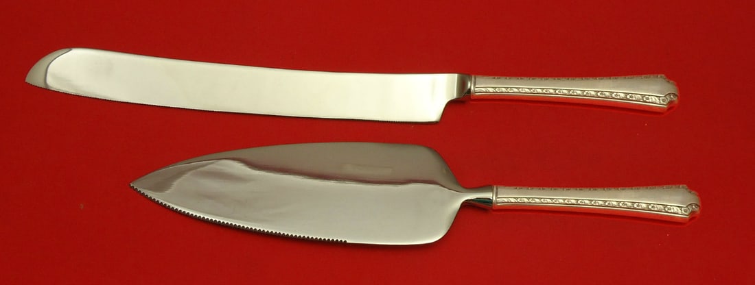 Wallace Larkspur sterling silver 2 piece cake serving set: Wallace Larkspur sterling silver 2 piece cake serving set This elegant two-piece wedding cake set from the Larkspur collection by Wallace features custom-made hollow sterling silver handles with stain