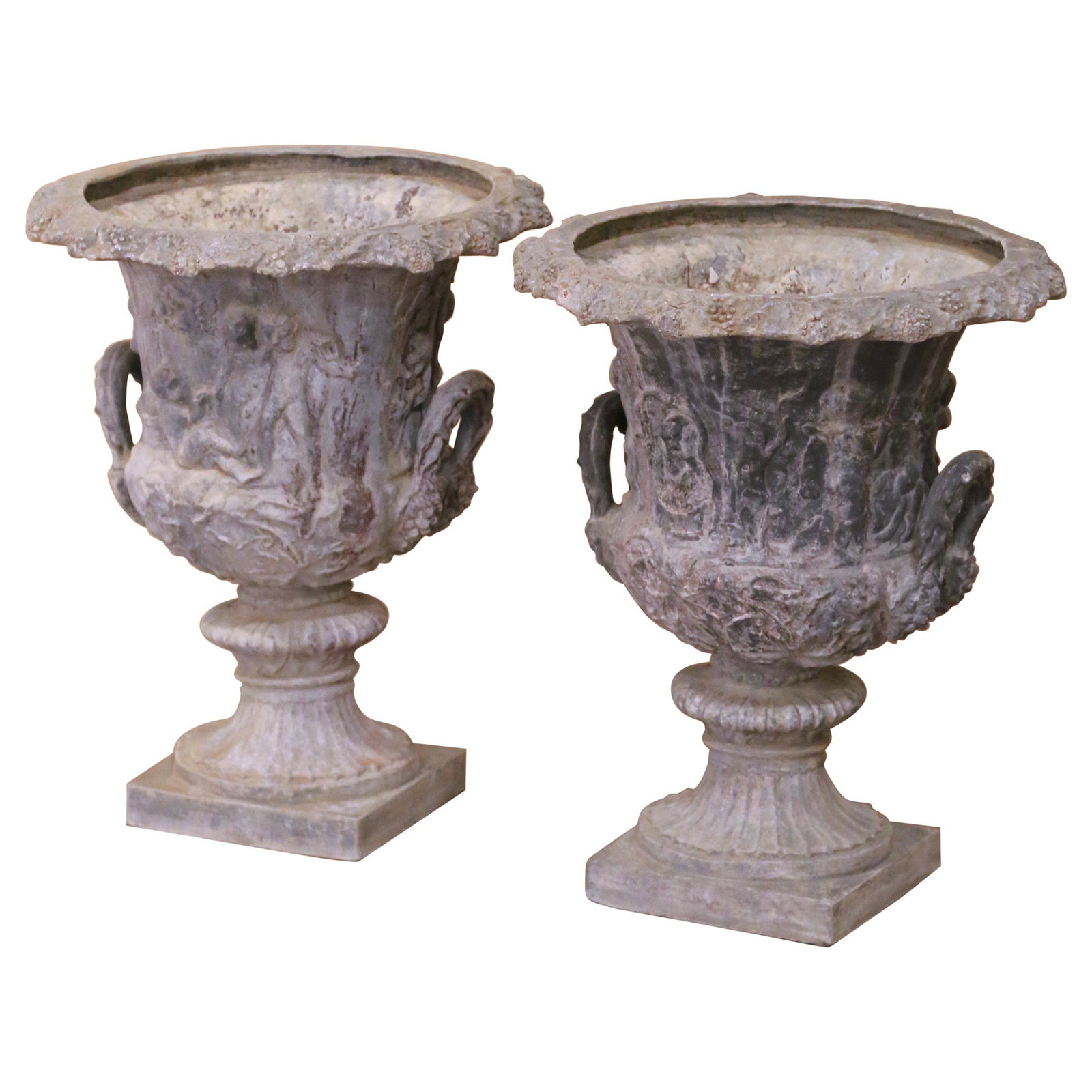 Set of Two Mid-Century French Lead Urn Planters with Grape Relief: Set of Two Mid-Century French Lead Urn Planters with Grape Relief This pair of mid-century French garden urn planters, crafted circa 1960, are made from heavy cast lead and feature a weathered gray pa