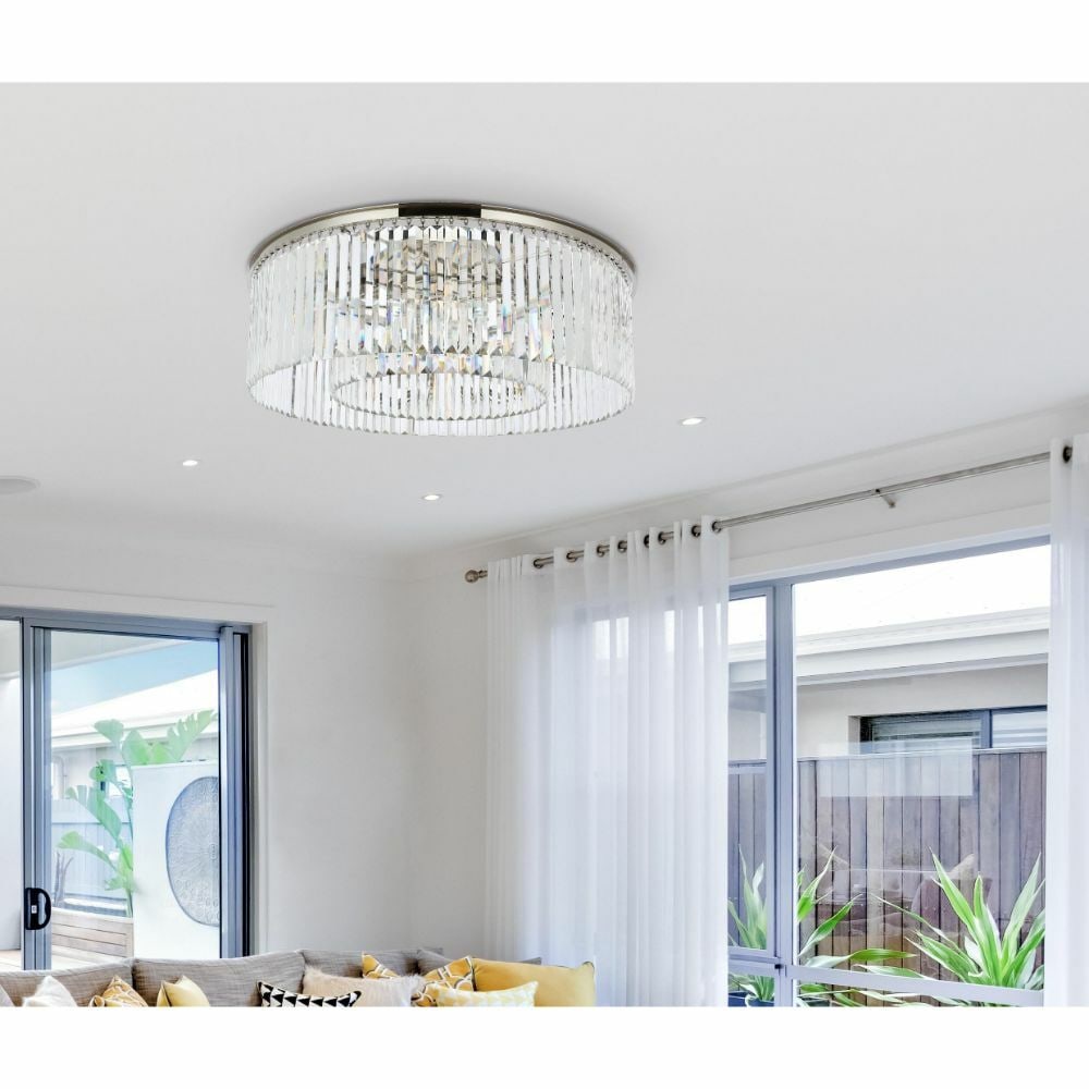 Sydney 10 Light Crystal Flush Mount Chandelier Polished Nickel: Sydney 10 Light Crystal Flush Mount Chandelier Polished Nickel Pre-owned crystal flush mount chandelier in a polished nickel finish, featuring clear Royal Cut crystals and a contemporary design. It me