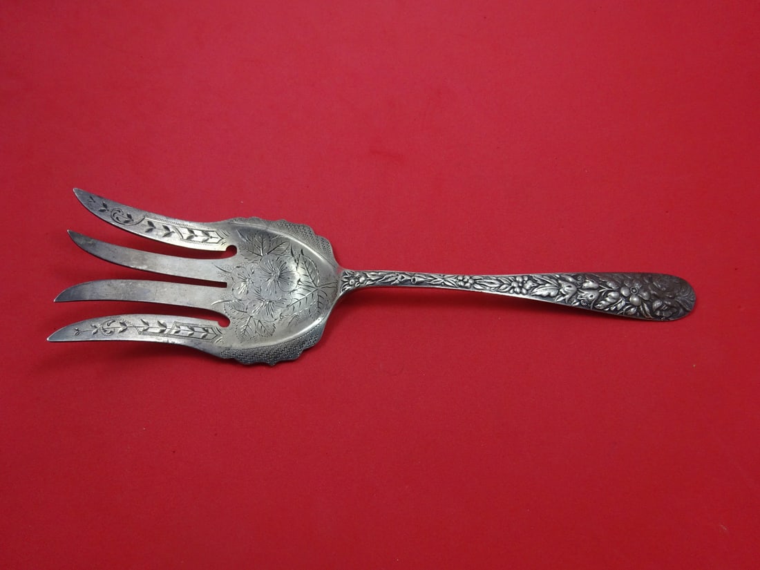 James R. Armiger Co. Repousse Sterling Silver Salad Serving Fork 9 3/4": James R. Armiger Co. Repousse Sterling Silver Salad Serving Fork 9 3/4" Elevate your dining experience with this exquisite Sterling Silver Salad Serving Fork by James R. Armiger Co. Measuring 9 3/4 in