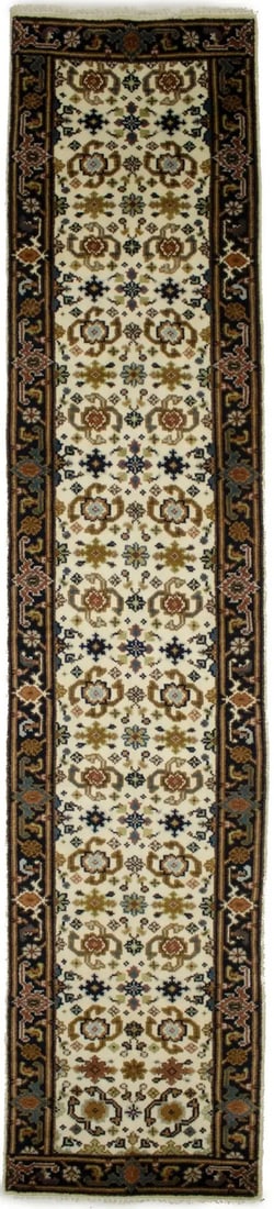 Cream wool hand-knotted floral runner rug 2'7 x 11'9: Cream wool hand-knotted floral runner rug 2'7 x 11'9 Enhance your living space with this exquisite 3' x 12' hand-knotted cream Chobi oriental runner rug. This beautiful rug features a floral pattern w