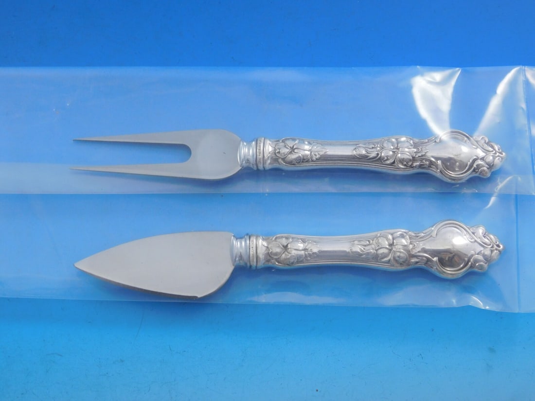 Wallace Violet Sterling Silver 2-Piece Cheese Serving Set Custom Made: Wallace Violet Sterling Silver 2-Piece Cheese Serving Set Custom Made Enhance your cheese serving experience with this exquisite 2-piece hard cheese serving set from Wallace in the elegant Violet patt