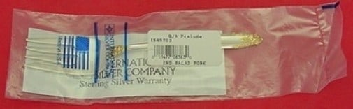 International Prelude Gold Accent Sterling Silver Salad Fork 6 5/8" New: International Prelude Gold Accent Sterling Silver Salad Fork 6 5/8" New This Prelude Gold Accent salad fork by International is a stunning piece crafted from sterling silver. Measuring 6 5/8 inches, i