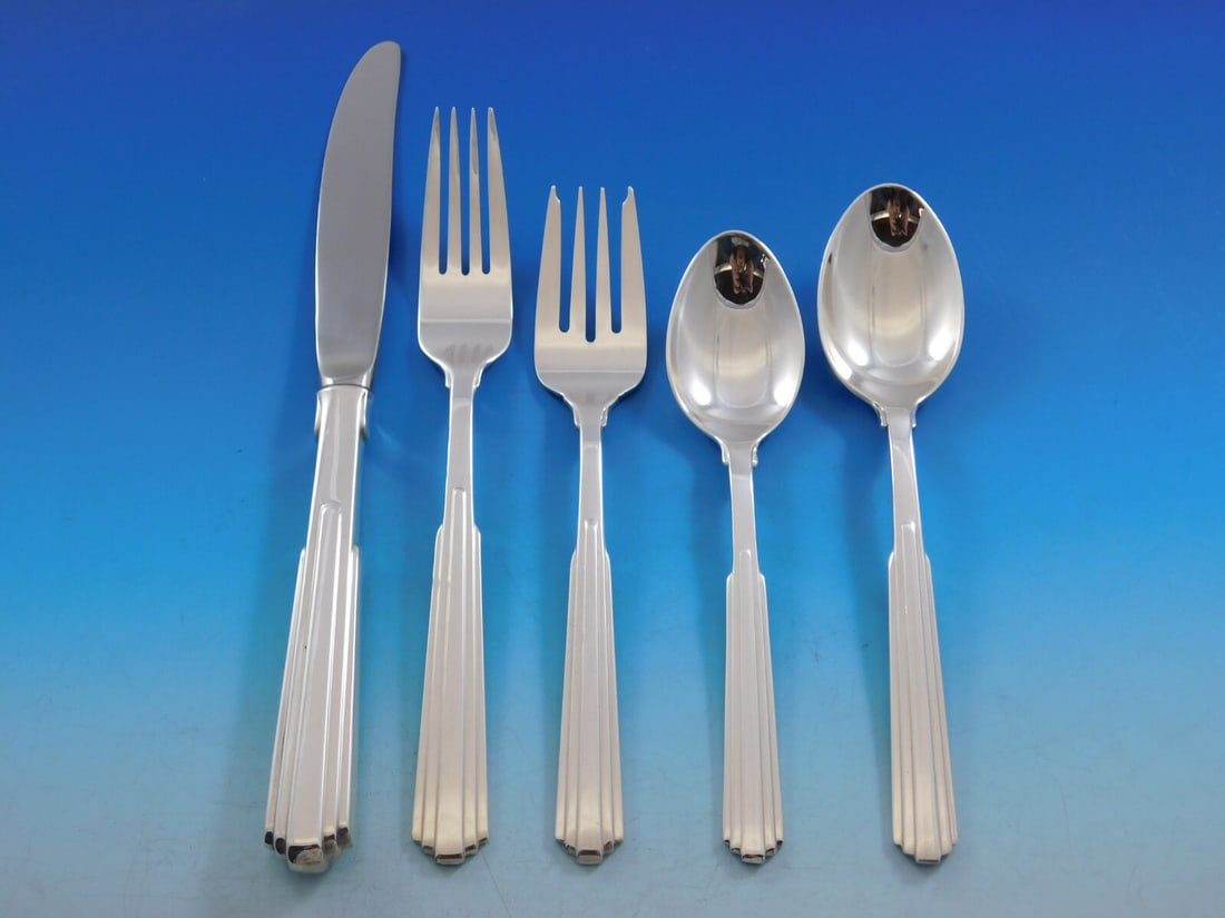 64 Piece Kirk Paramount Sterling Silver Flatware Service for 12: 64 Piece Kirk Paramount Sterling Silver Flatware Service for 12 This Paramount by Kirk sterling silver flatware set features a striking mid-century modern design inspired by city skylines and architec