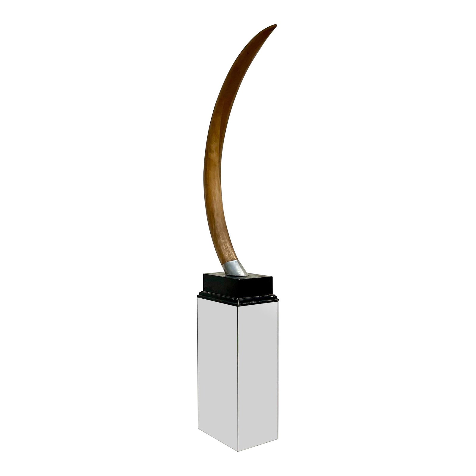 Vintage Faux Resin Elephant Tusk Sculpture on Black Plinth: Vintage Faux Resin Elephant Tusk Sculpture on Black Plinth This stunning vintage faux resin elephant tusk is a remarkable decorative piece that commands attention. It is elegantly mounted on a black l