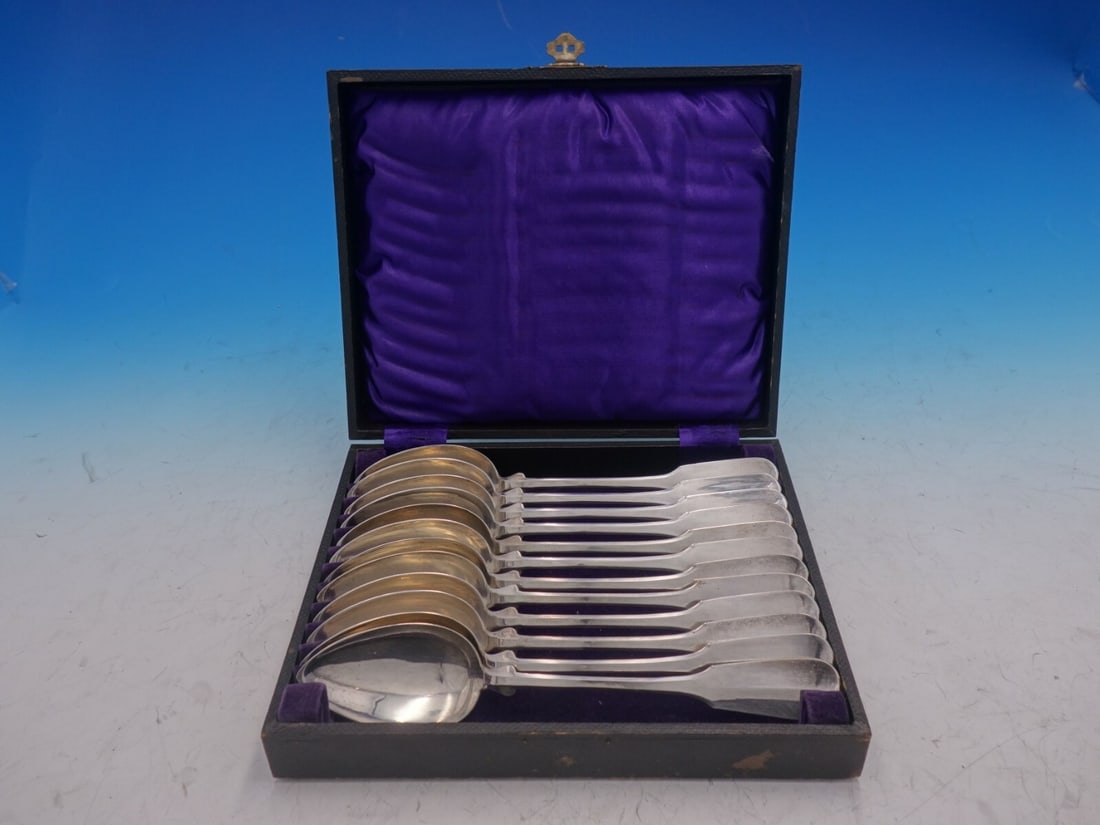 Bruckmann & Sohne 800 Silver Smooth Rib Dinner Spoon Set of 12: Bruckmann & Sohne 800 Silver Smooth Rib Dinner Spoon Set of 12 This elegant set features twelve dinner spoons, crafted from 800 silver alloy by Bruckmann & Sohne. The spoons showcase a refined smooth 