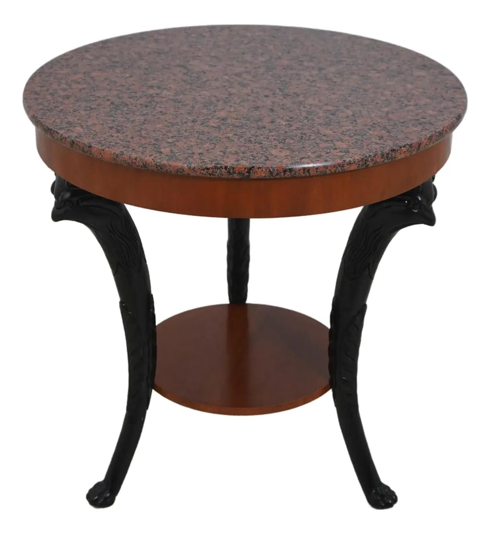Baker Empire Style Round Walnut Lamp Table with Marble Top: Baker Empire Style Round Walnut Lamp Table with Marble Top This exquisite Baker Carved Round Lamp Table features a stunning marble top with fine granite detailing. Crafted approximately 40 years ago, 