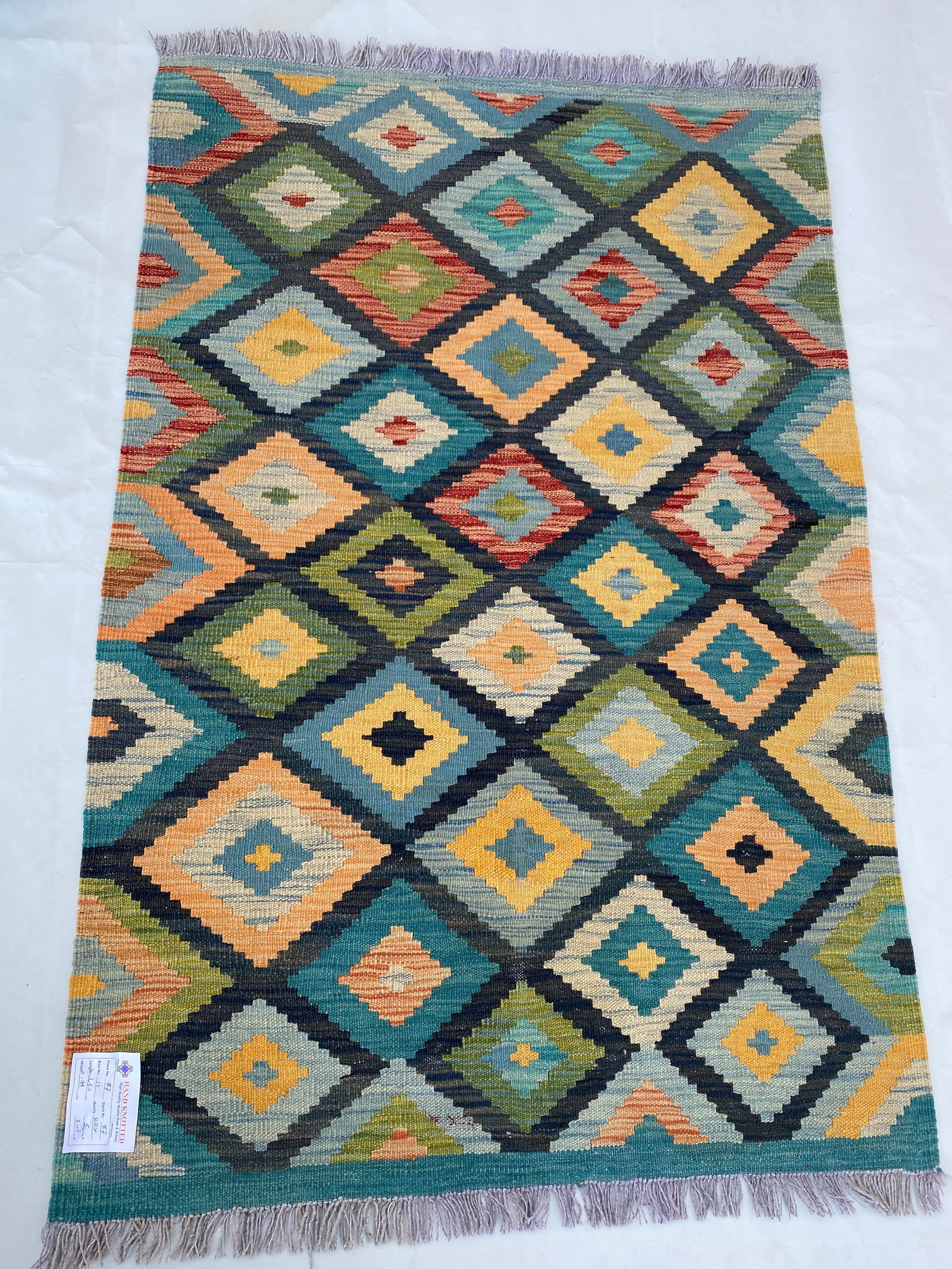 Handmade 3' x 5' Multi-Color Navy Blue Afghan Kilim Rug: Handmade 3' x 5' Multi-Color Navy Blue Afghan Kilim Rug Free continental US Shipping Introducing our captivating 3' x 5' Multi-Color Navy Blue Kilim Rug, a beautiful blend of timeless tradition and co