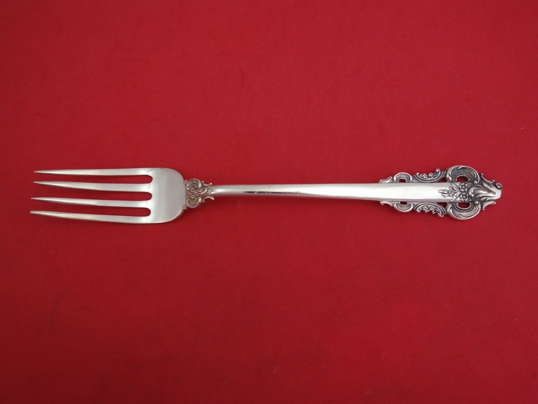 Camusso Grande Monarch Sterling Silver Serving Fork 10 inches: Camusso Grande Monarch Sterling Silver Serving Fork 10 inches This elegant vegetable serving fork is crafted from high-quality Peruvian sterling silver and features the exquisite Grande Monarch patter