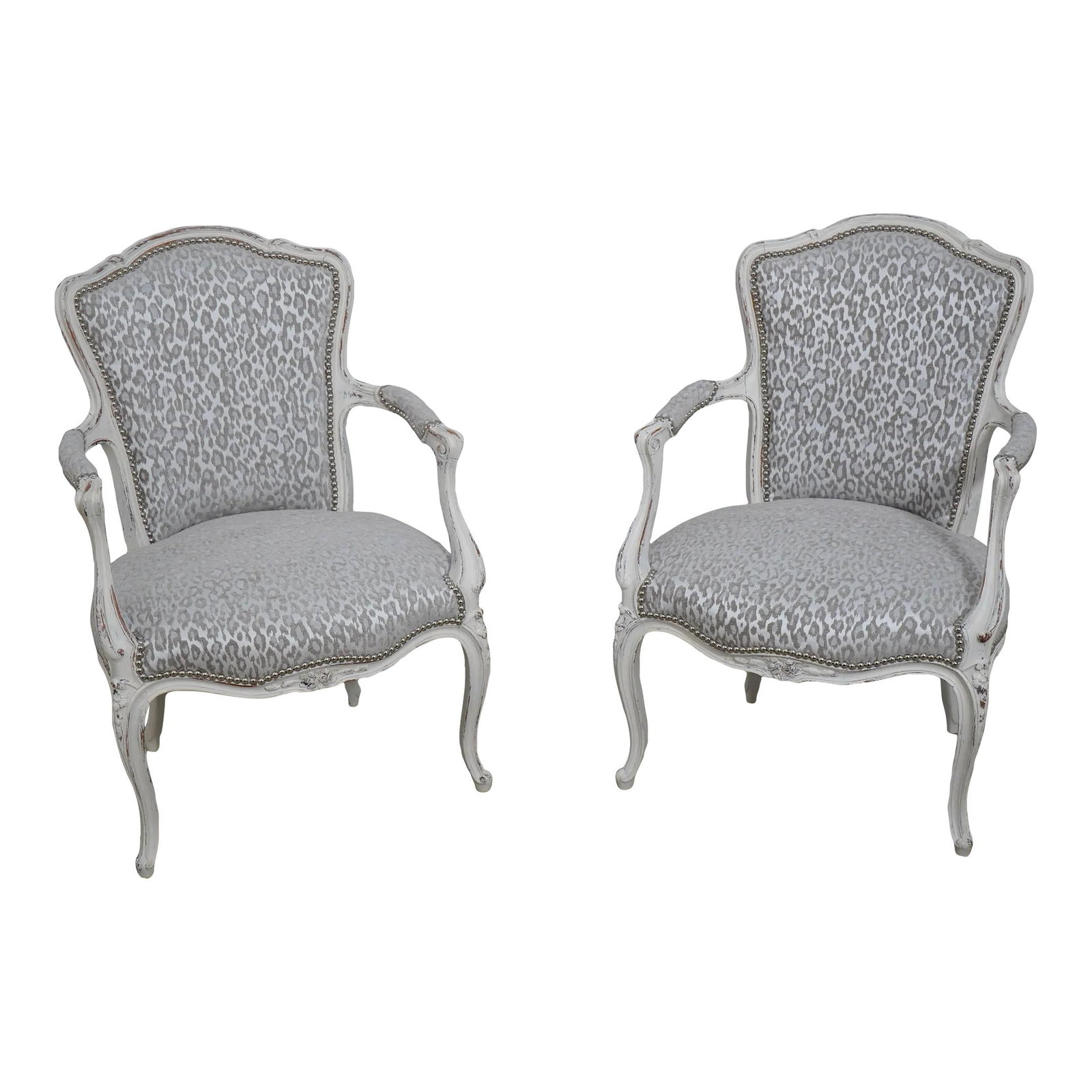 Elegant Pair of French Louis XV Open Armchairs Upholstered: Elegant Pair of French Louis XV Open Armchairs Upholstered This elegant pair of French Louis XV open armchairs features a stunning modern print upholstery, expertly reupholstered to enhance both comfo