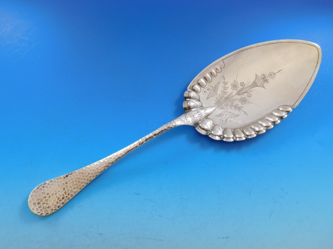 Wood & Hughes Sterling Silver Brite-Cut Pie Server 10.5 Inch Hammered Finish: Wood & Hughes Sterling Silver Brite-Cut Pie Server 10.5 Inch Hammered Finish This exquisite pie server, crafted by Wood & Hughes, showcases a stunning Brite-Cut design. Made entirely of sterling silve