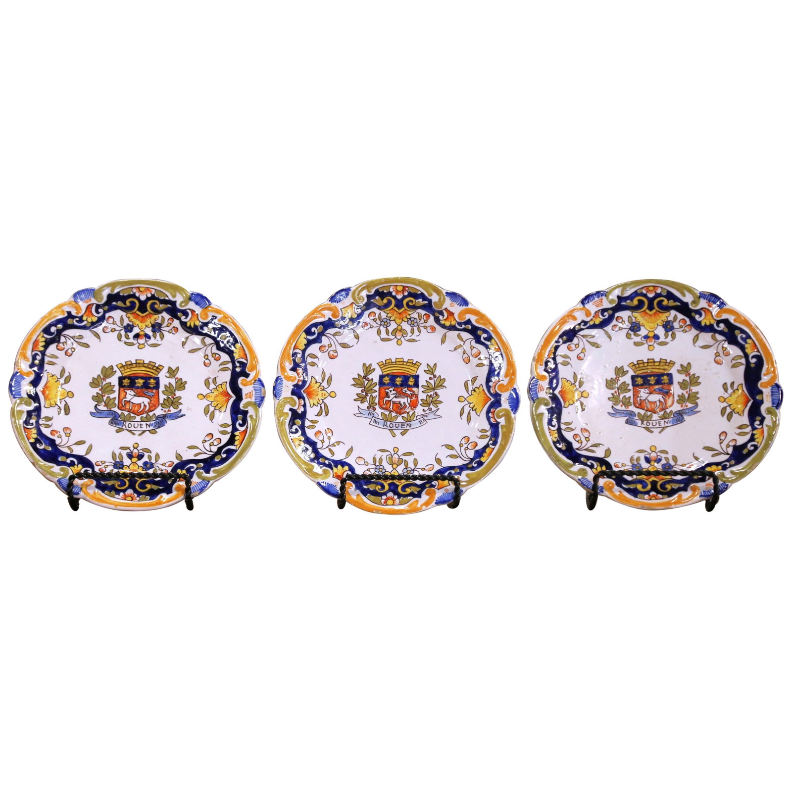 Set of 3 Rouen Faience Armorial Wall Plates French: Set of 3 Rouen Faience Armorial Wall Plates French This set of three early 20th-century French Rouen faience wall plates showcases traditional craftsmanship and decorative artistry. Each hand-crafted 