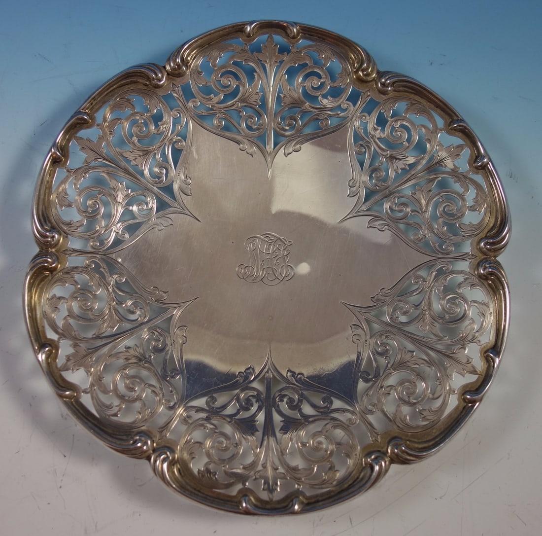 Tiffany & Co. Sterling Silver Serving Plate with Pierced Border: Tiffany & Co. Sterling Silver Serving Plate with Pierced Border This elegant Sterling Silver Serving Plate, expertly crafted for Tiffany & Co., features a stunning pierced and chased wide border. The 