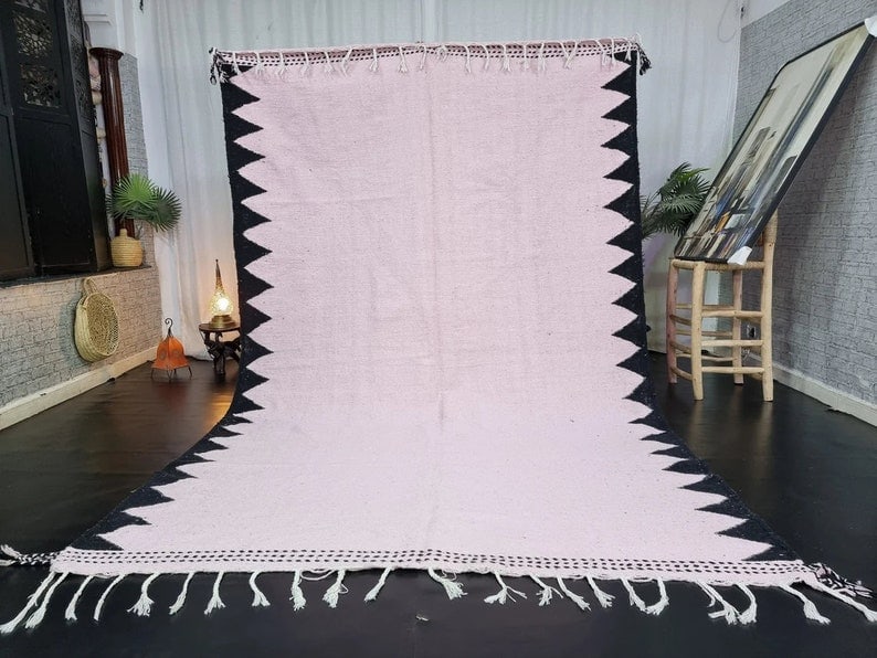 Handwoven Moroccan Rug 100% Sheep Wool 10 x 5 Feet: Handwoven Moroccan Rug 100% Sheep Wool 10 x 5 Feet Discover the beauty of this Elegant Authentic Rug, handwoven in the stunning Atlas Mountains by skilled Berber women weavers. Crafted using tradition