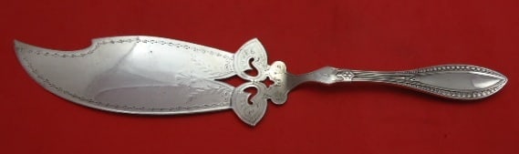 Whiting Indian Sterling Silver Pierced Fish Server 12 3/4 inches: Whiting Indian Sterling Silver Pierced Fish Server 12 3/4 inches This exquisite fish server is from the renowned Whiting brand, showcasing the elegant Indian pattern. Crafted in sterling silver, this 