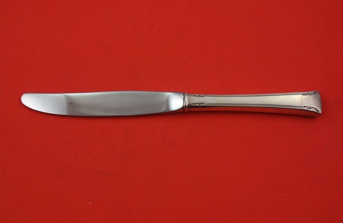 International Serenity Sterling Silver Dessert Knife 7in Serrated Blade: International Serenity Sterling Silver Dessert Knife 7in Serrated Blade Serenity by International is a modern serrated dessert knife with a sterling silver hollow handle and stainless blade. It is not