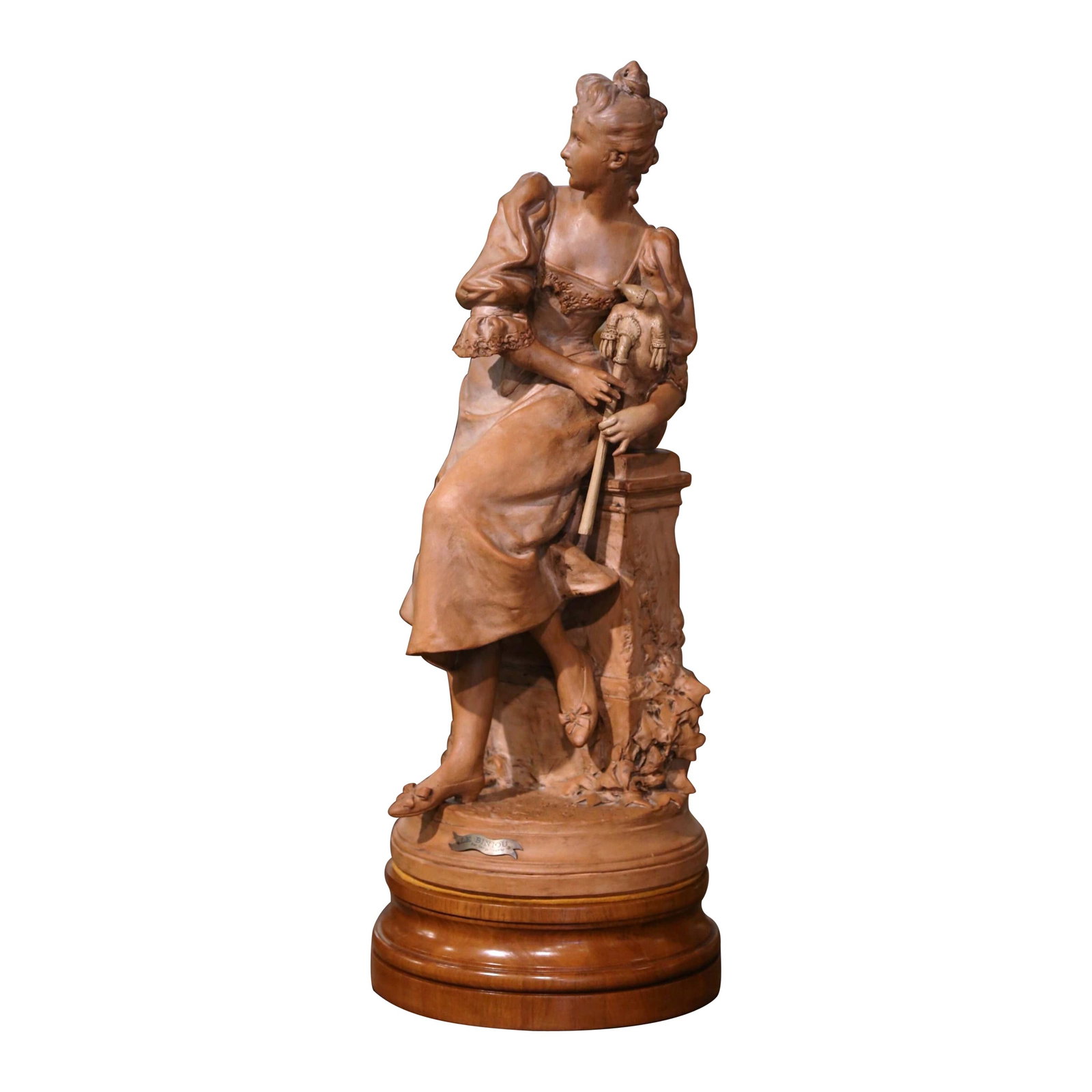 French Terracotta Sculpture Le Biniou by Georges Coudray 32 in: French Terracotta Sculpture Le Biniou by Georges Coudray 32 in This late 19th-century French terracotta sculpture, titled "Le Biniou" and created by Georges Charles Coudray circa 1890, features a fine
