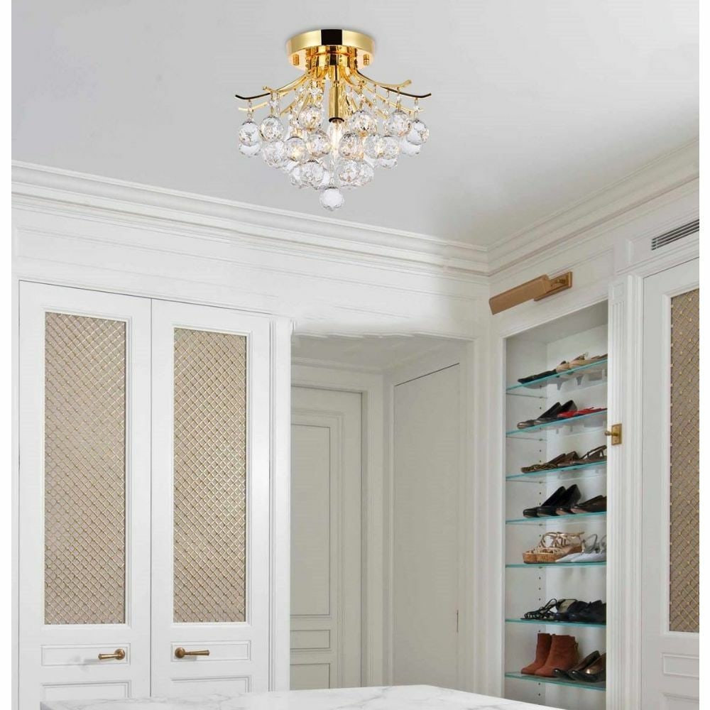 Toureg 3-Light Gold Crystal Flush Mount Chandelier 12 inch: Toureg 3-Light Gold Crystal Flush Mount Chandelier 12 inch This modern flush mount chandelier features a gold-plated finish and is adorned with royal cut clear crystal elements. Designed for indoor in