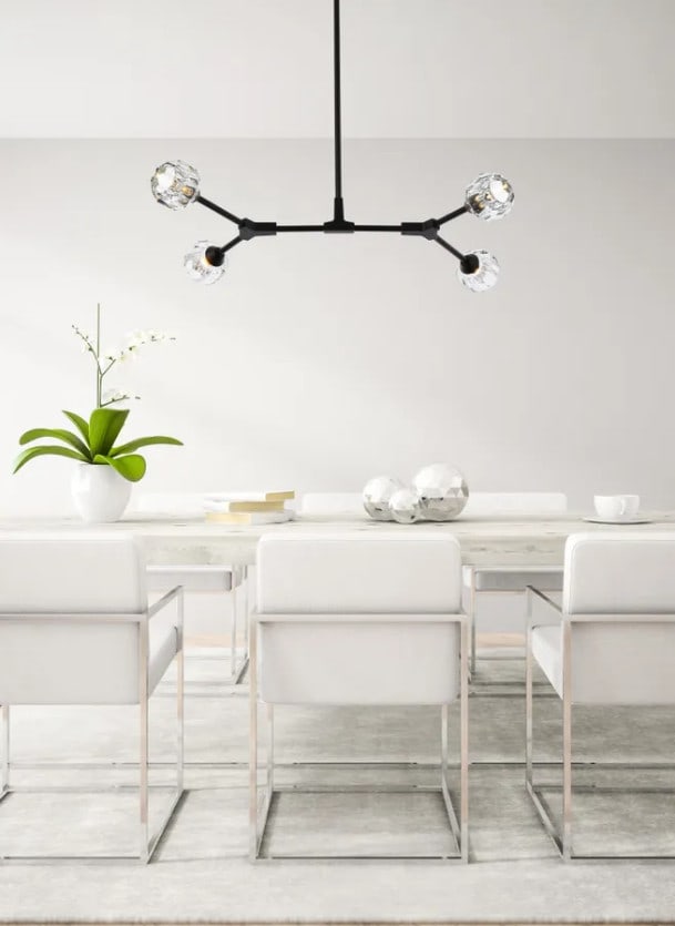 Black Crystal 4 Light Zayne Pendant Chandelier: Black Crystal 4 Light Zayne Pendant Chandelier This modern chandelier pendant features a black iron frame with clear crystal shades, offering a stylish lighting solution for various indoor spaces such