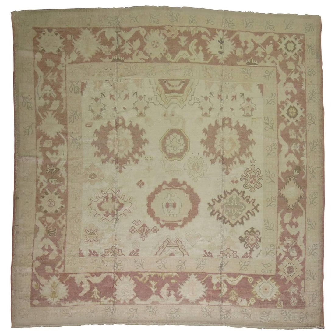 9 x 9 Turkish Oushak Wool Rug: 9 x 9 Turkish Oushak Wool Rug This one-of-a-kind Turkish Oushak rug features a full square design, crafted in the Arts and Crafts style. Woven from soft, luscious wool, the rug showcases a predominant