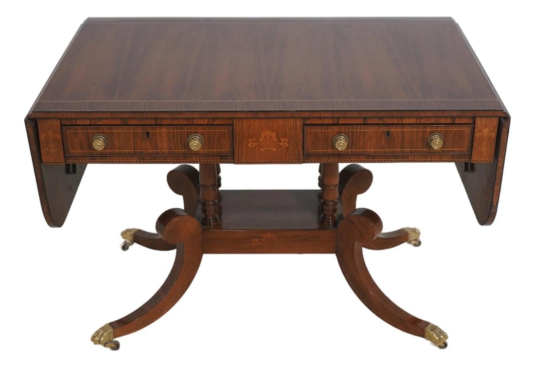 Irish Regency Style Sofa Table With Rosewood Inlay And Brass Paw Feet: Irish Regency Style Sofa Table With Rosewood Inlay And Brass Paw Feet This Irish Regency sofa table from the Stately Homes Collection by Baker features rosewood inlay and is modeled after an original 