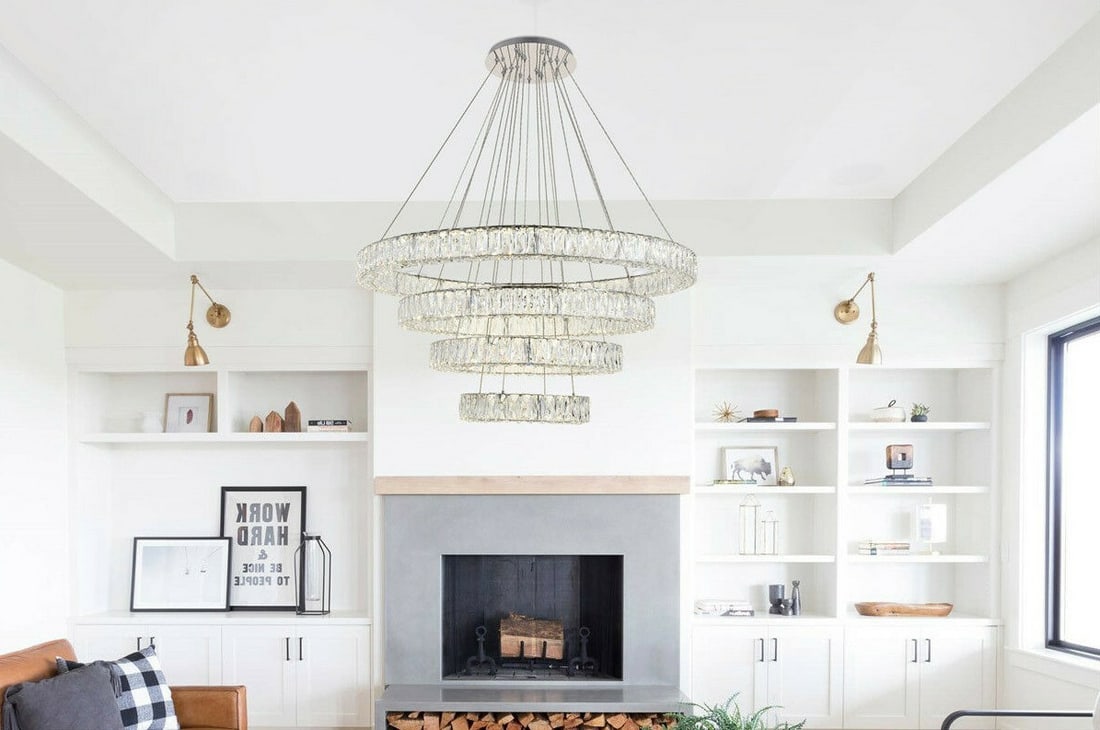 MONROE Chrome Crystal LED Chandelier 42 inch Adjustable: MONROE Chrome Crystal LED Chandelier 42 inch Adjustable This modern crystal chandelier features a striking design with four tiers of stainless steel rings in a polished chrome finish, adorned with roy