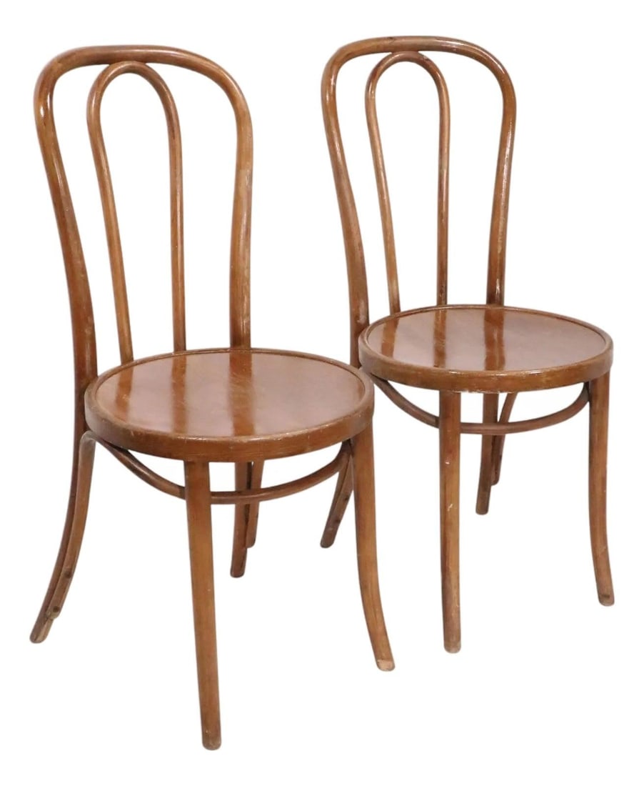 Pair of Thonet Vienna Secessionist Bentwood Bistro Dining Chairs: Pair of Thonet Vienna Secessionist Bentwood Bistro Dining Chairs A pair of early 20th century Vienna Secessionist bentwood cafe and bistro dining chairs marked Thonet. They are described as being in v