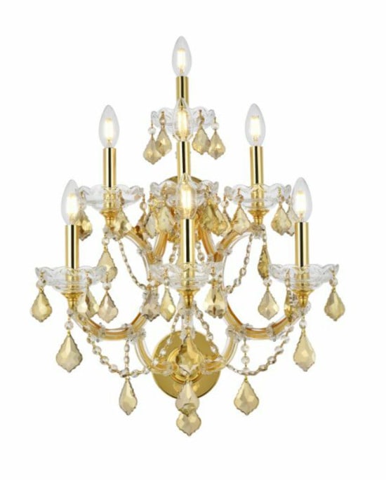 Maria Theresa Gold Crystal 7 Light Wall Sconce 27 inch: Maria Theresa Gold Crystal 7 Light Wall Sconce 27 inch This Maria Theresa wall sconce features a gold frame adorned with golden teak (smoky) Royal Cut crystals, offering a luxurious and elegant lighti