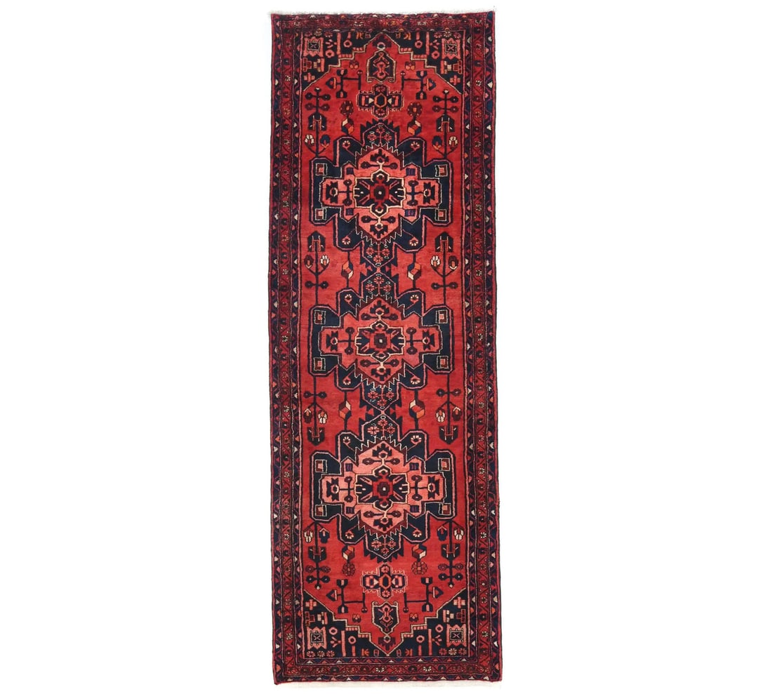 Vintage Wool Hand Knotted Tribal Floral Runner 3'7 x 9'11: Vintage Wool Hand Knotted Tribal Floral Runner 3'7 x 9'11 This vintage hand-knotted runner features a tribal floral pattern in shades of red, purple-navy, cream, maroon, coral, and more. Crafted from 