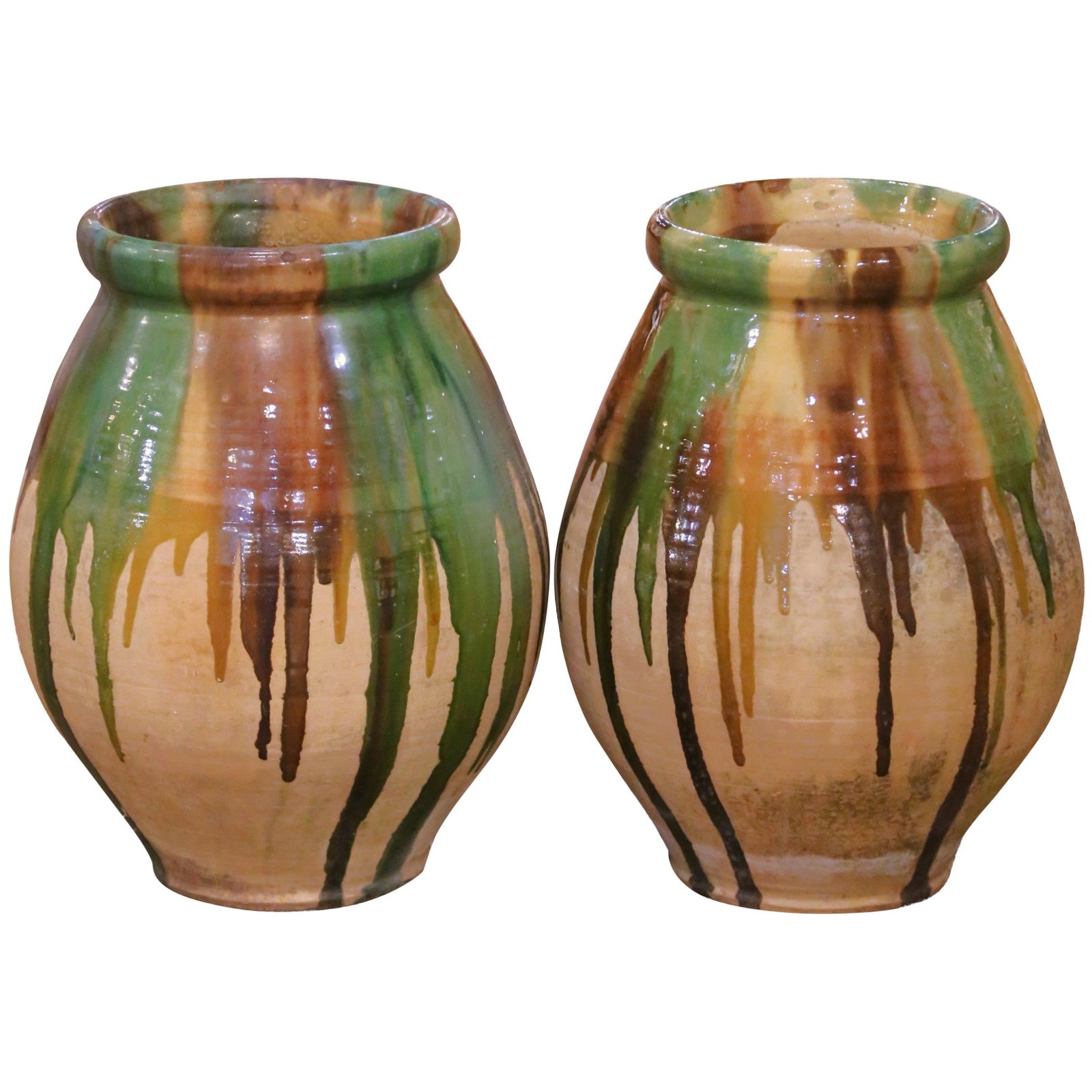 Set of 2 French Terracotta Olive Oil Jars: Set of 2 French Terracotta Olive Oil Jars This pair of authentic late 19th-century French olive oil jars was crafted in Provence around 1880. Each jar is hand-thrown from coarse terracotta and finishe